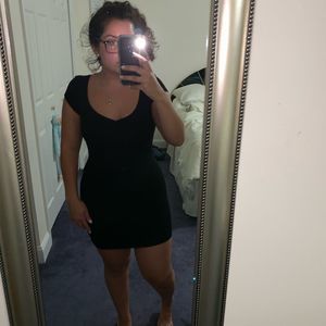 Black bodycon dress with open back